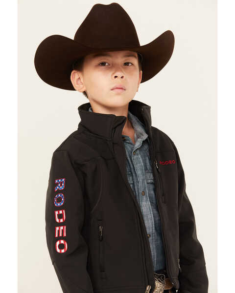 Image #1 - Rodeo Clothing Boys' USA Flag Waterproof Softshell Jacket , Black, hi-res
