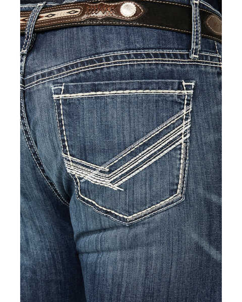 Image #4 - Cinch Men's Ian Medium Stonewash Slim Bootcut Performance Stretch Denim Jeans , Indigo, hi-res