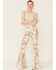 Image #1 - Saints & Hearts Women's Cow Print High Rise Raw Hem Flare Jeans, Taupe, hi-res