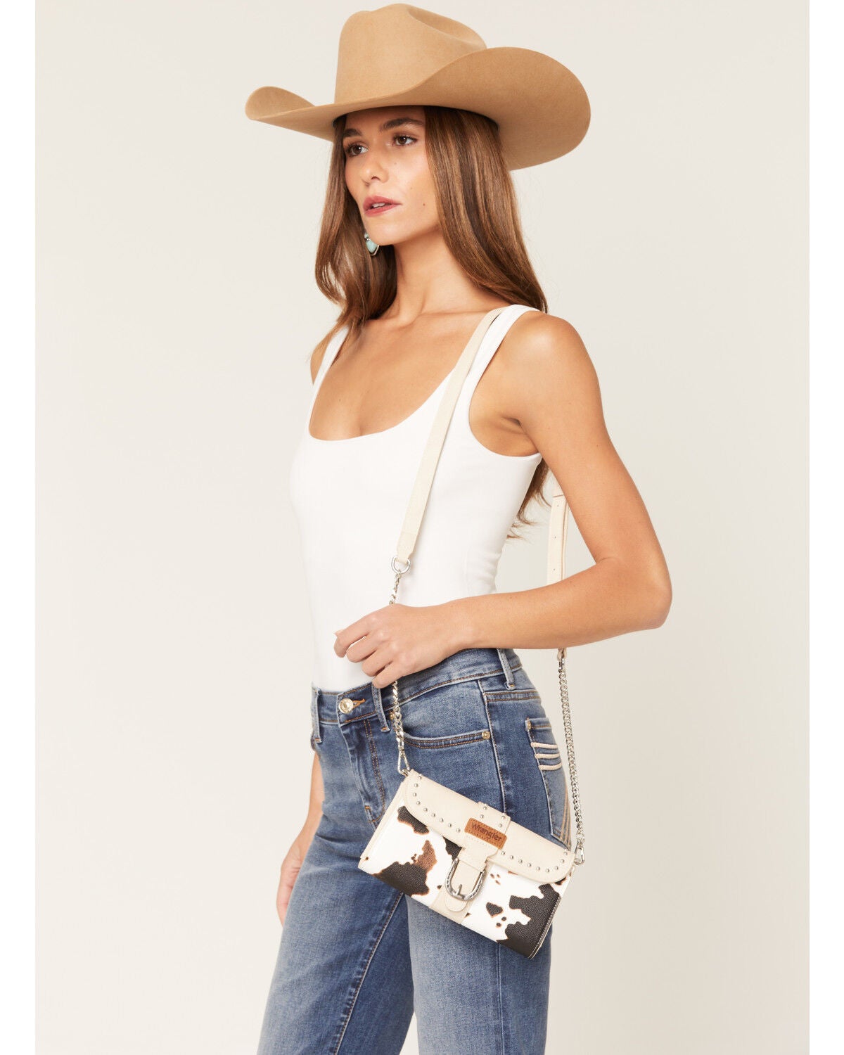 Image #1 - Wrangler X Boot Barn Women's Cow Print Buckle Clutch, Beige, hi-res