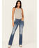 Image #3 - Miss Me Women's Medium Wash Mid Rise Fleur de Lis Pocket Bootcut Stretch Denim Jeans, Medium Wash, hi-res