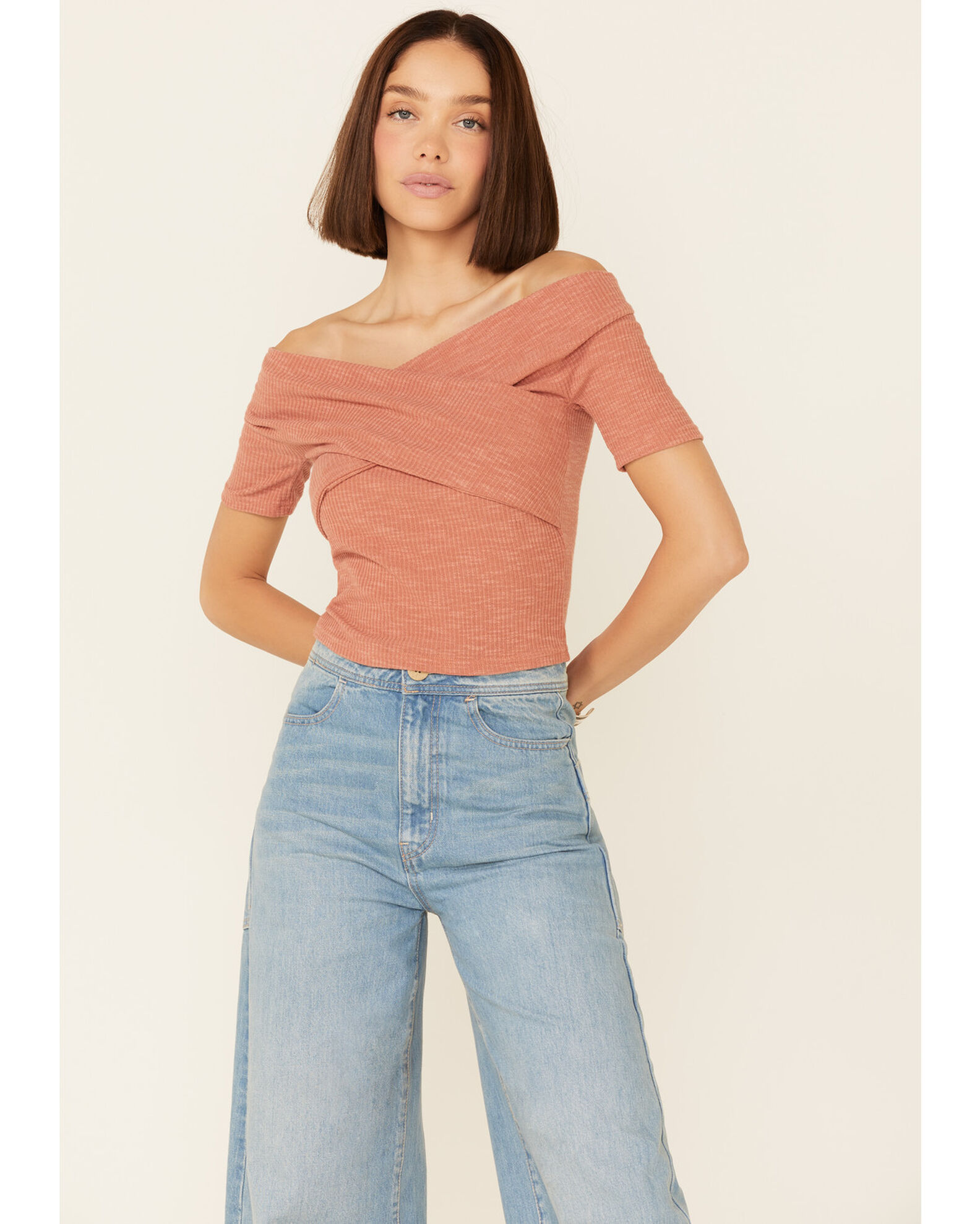 Cross shoulder top sales
