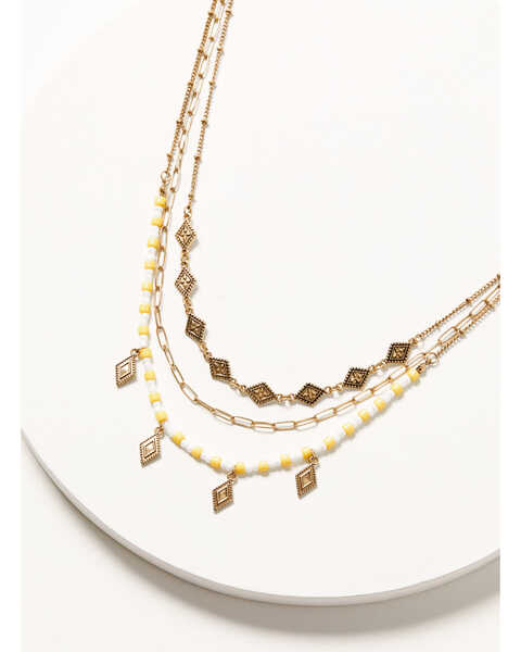 Image #1 - Shyanne Women's Yellow & Gold Beaded Diamond Charm Layered Necklace, Bronze, hi-res
