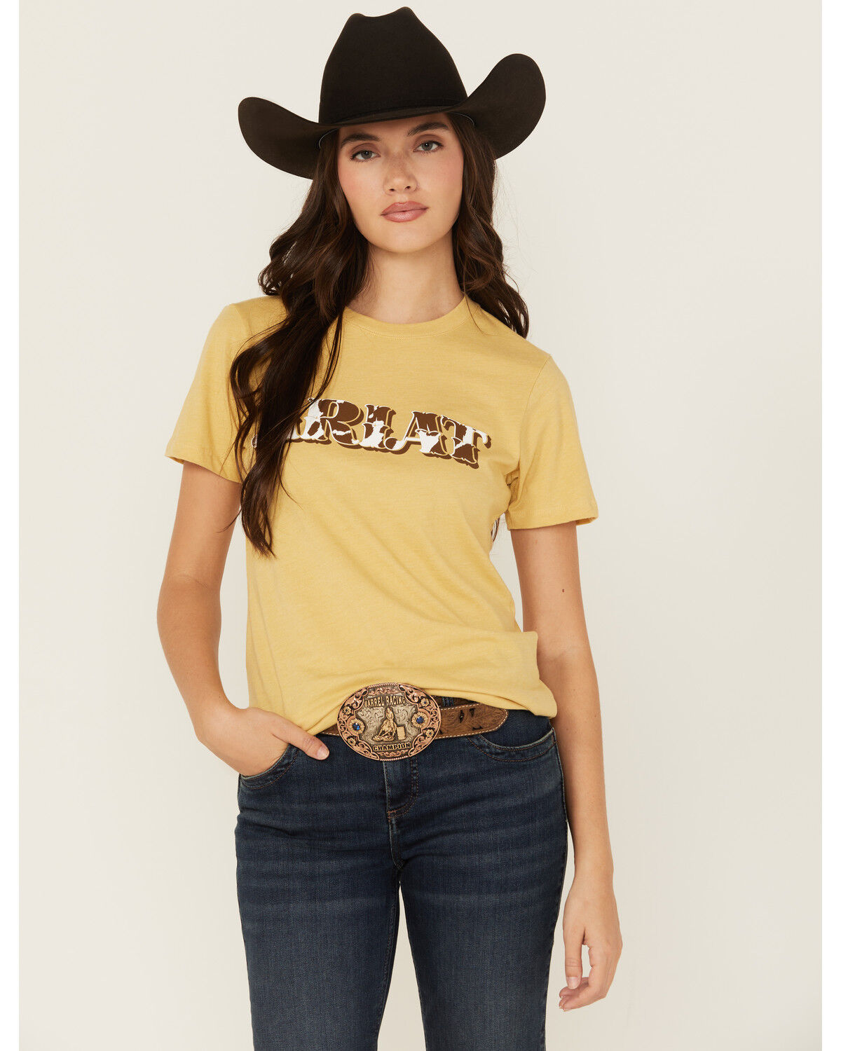 Image #1 - Ariat Women's Boot Barn Exclusive Cow Print Logo Short Sleeve Graphic Tee, Mustard, hi-res