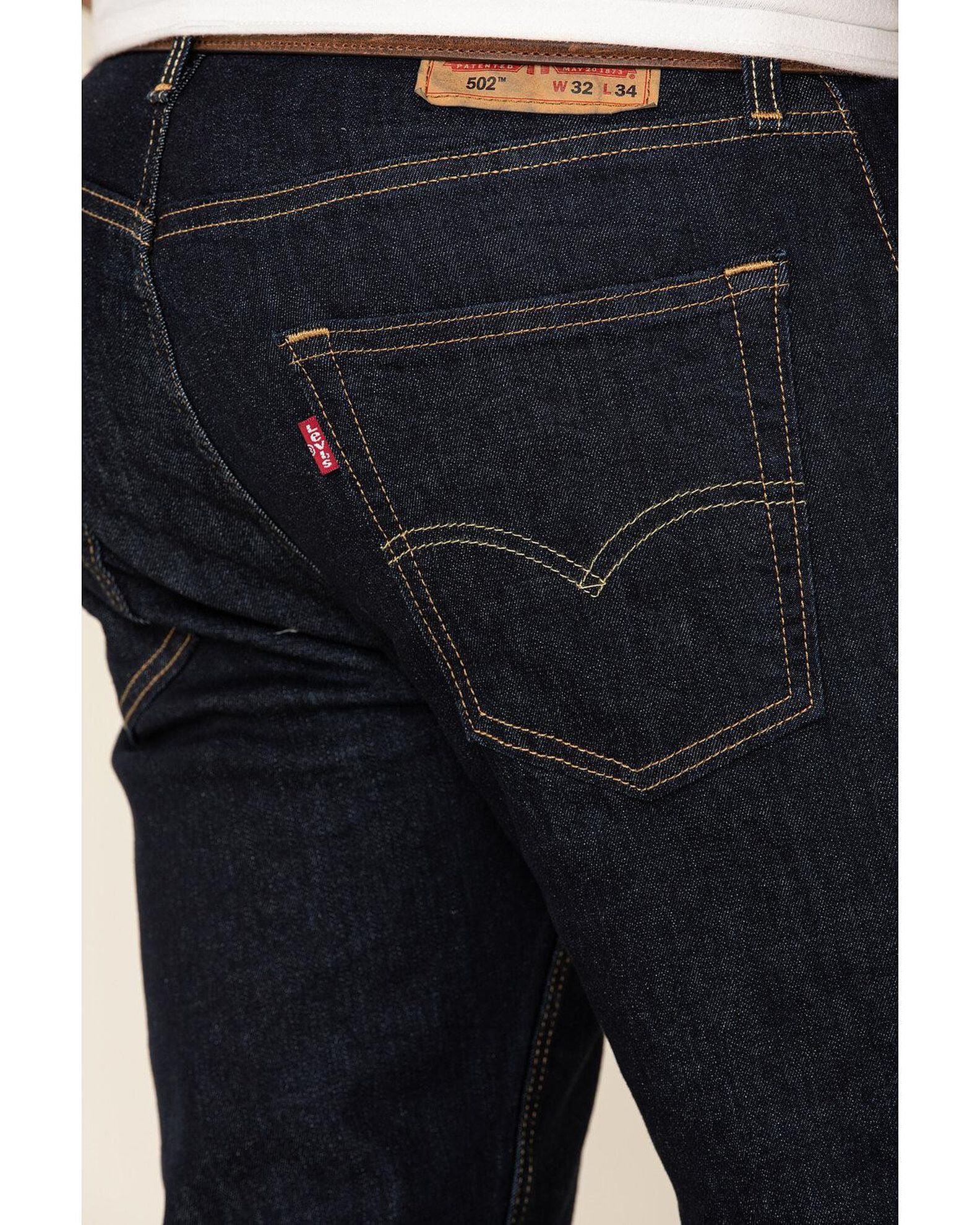 Dark hollow color levis sales