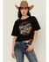Image #1 - Shyanne Women's Wanderlust Fringe Back Short Sleeve Graphic Tee, Black, hi-res