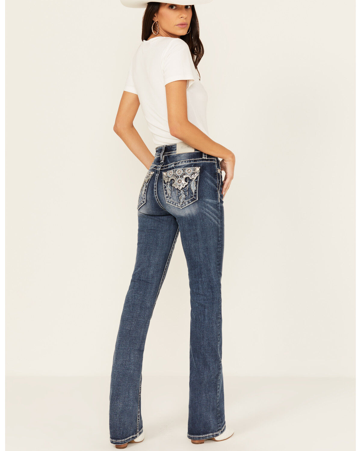 Image #1 - Miss Me Women's Dark Rise Mid Wash Geo Feather Pocket 34" Bootcut Stretched Denim Jeans, Dark Wash, hi-res