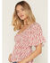 Image #2 - Yura Women's Boot Barn Exclusive Ditsy Floral Smocked Short Sleeve Top, Red, hi-res
