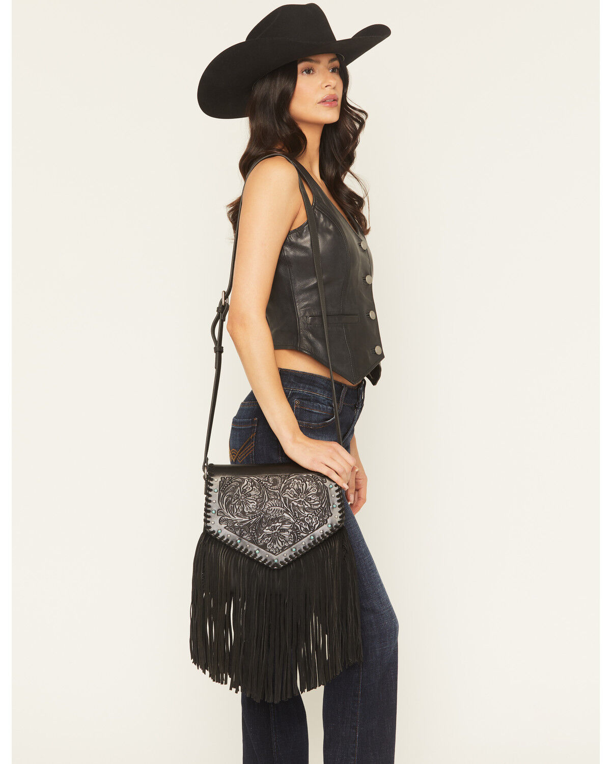 Image #1 - Idyllwind Women's Granada Tooled Fringe Crossbody Bag, Black, hi-res