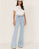 Image #1 - Flying Tomato Women's Light Wash High Rise Waist Tie Flare Jeans, Blue, hi-res