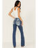Image #1 - Miss Me Women's Medium Wash Mid Rise Border Flap Pocket Bootcut Stretch Denim Jeans , Medium Wash, hi-res