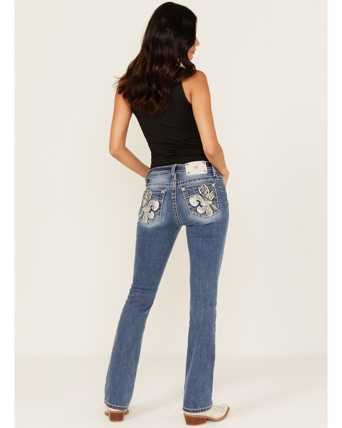 Image #1 - Miss Me Women's Medium Wash Slim Fit Fleur de Lis Pocket Bootcut Stretch Denim Jeans, Medium Wash, hi-res