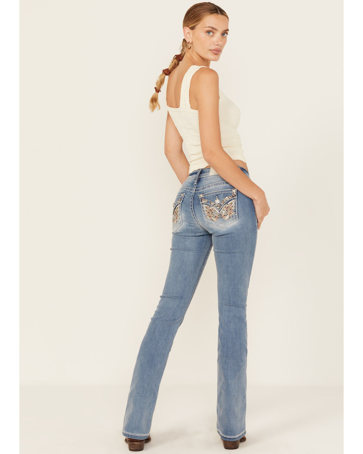 Image #1 - Miss Me Women's Light Wash Mid Rise Butterfly Pocket Bootcut Stretch Denim Jeans, Light Wash, hi-res
