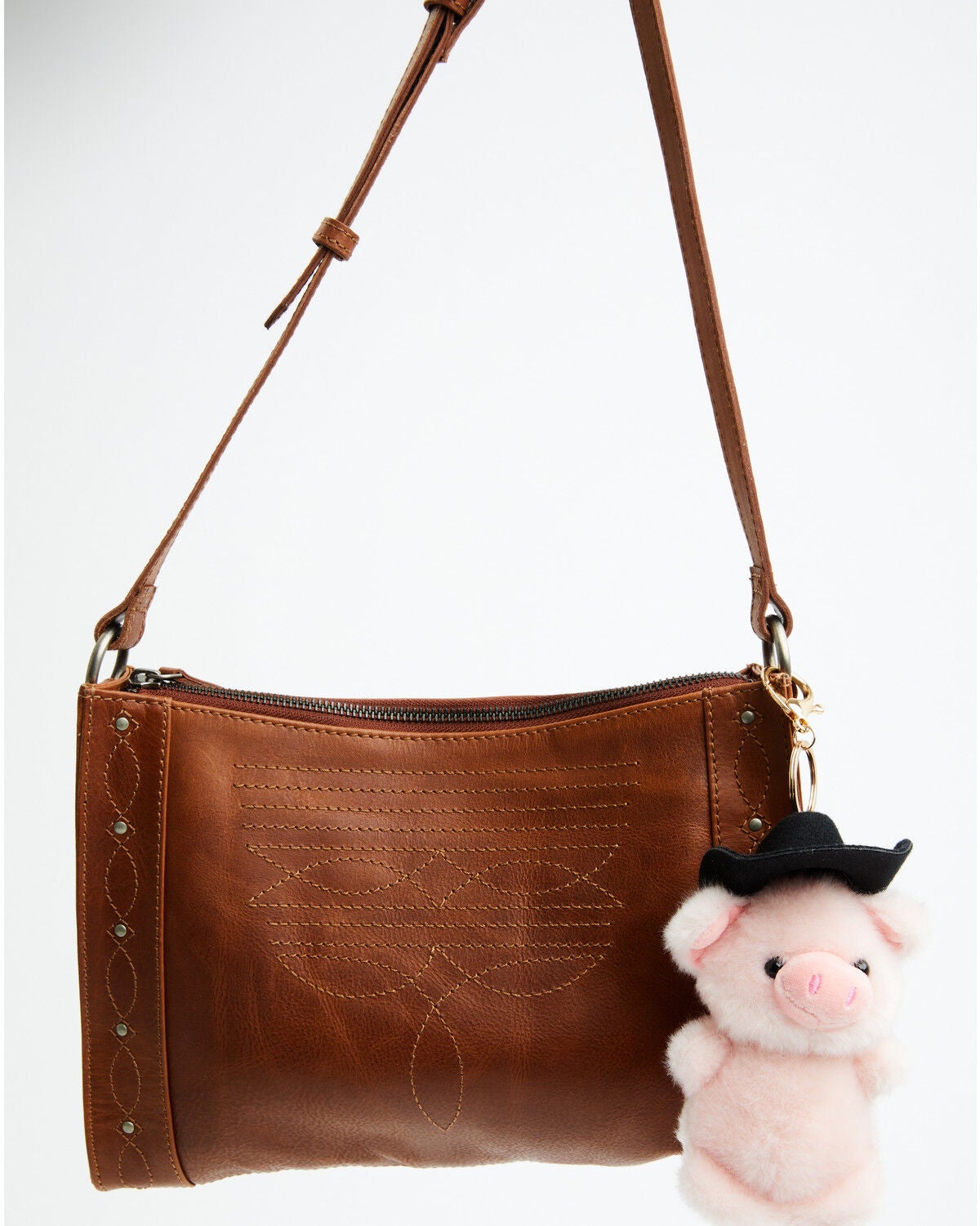 Image #1 - Shyanne Cowgirl Pig Plush Bag Charm, Brown, hi-res