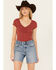 Image #1 - Shyanne Women's V Neck Short Sleeve Stretch Knit Top , Rust Copper, hi-res