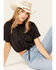 Image #1 - Cleo + Wolf Women's Living Free Graphic Drawcord Crop Tee, Black, hi-res