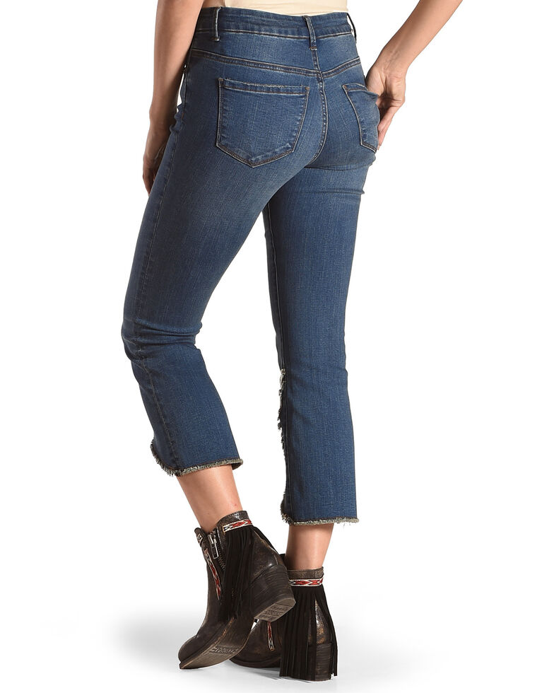 torn hem jeans