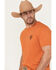Image #3 - Ariat Men's Barb Shield Short Sleeve Graphic T-Shirt, Rust Copper, hi-res