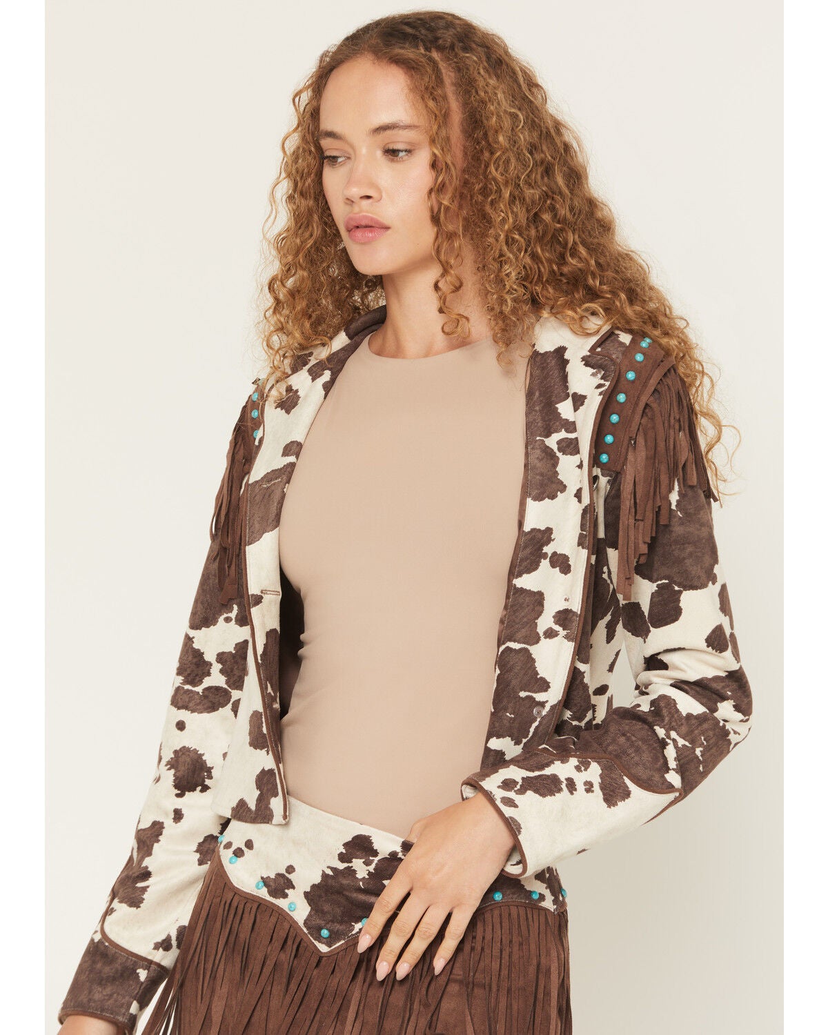 Image #1 - Shyanne Women's Porter Cow Print Faux Suede Embellished Fringe Moto Jacket, Brown, hi-res