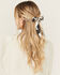 Image #1 - Shyanne Women's Sylvie Cow Print Bow Hair Clip, Black, hi-res