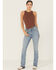 Image #2 - Wrangler X Lainey Wilson Women's Sky Medium Wash High Rise Boot Hugger Bootcut Stretch Denim Jeans, Medium Wash, hi-res