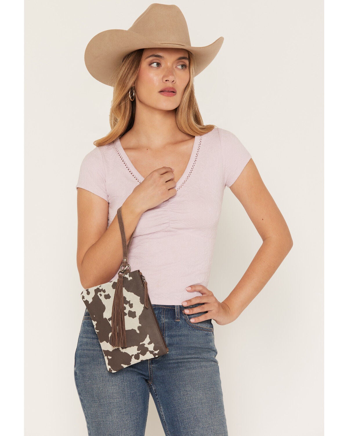Shyanne Women's Cow Print Suede Wristlet Pouch, Brown, hi-res