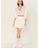 Image #1 - Wishlist Women's Smocked Waist Ruffle Tiered Mini Skirt, White, hi-res