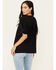 Image #4 - Idyllwind Women's Outlaw Livin' Short Sleeve Graphic Tee, Black, hi-res